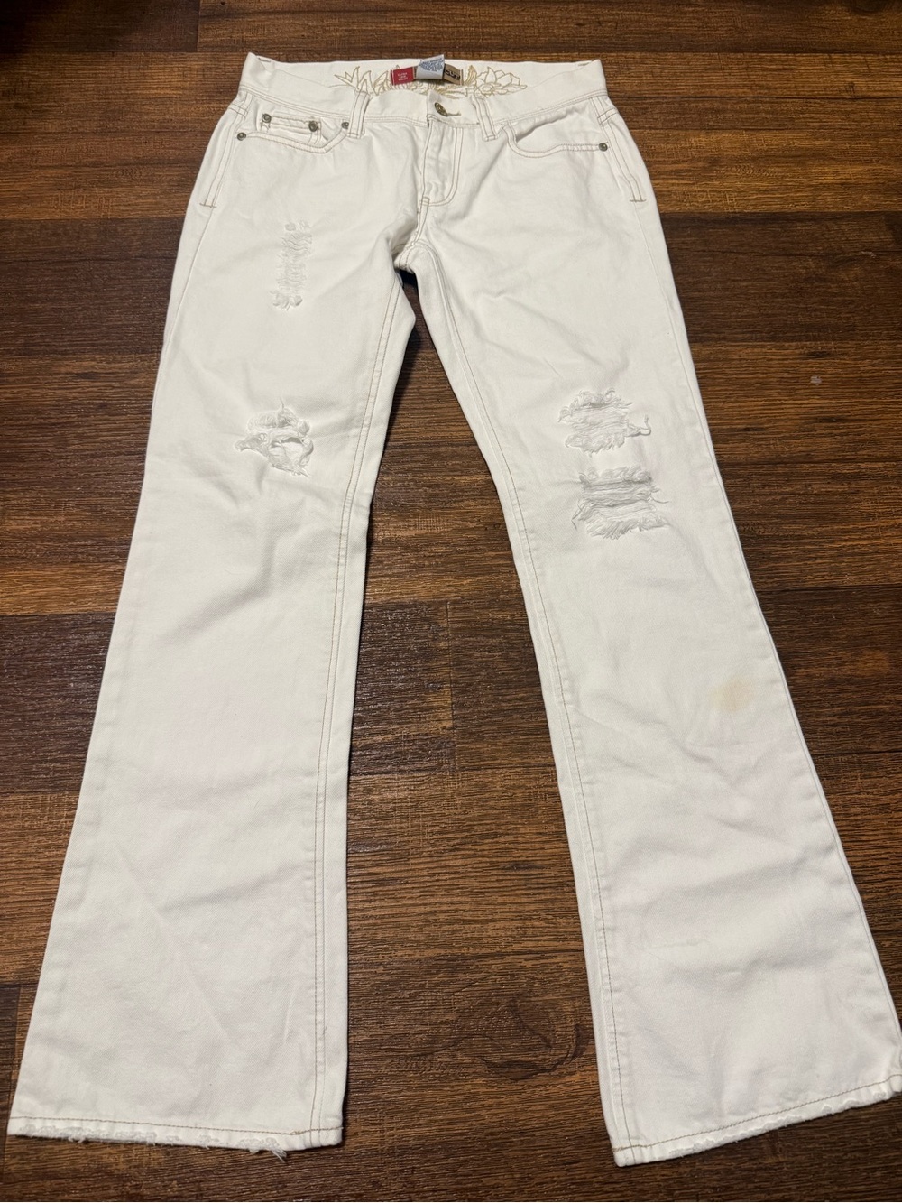 Y2K one hundred percent cotton low rise flared distressed jeans